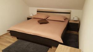 En eller flere senge i et værelse på Guest Accommodation Marko Kesić
