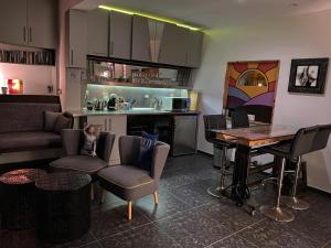 Kuchyň nebo kuchyňský kout v ubytování BOCO Boutique Hotel