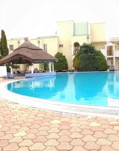 The swimming pool at or close to Helena Stúdió Apartman