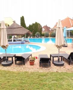 The swimming pool at or close to Helena Stúdió Apartman
