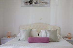 Posteľ alebo postele v izbe v ubytovaní Hortenzija Apartments