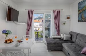 Posedenie v ubytovaní Hortenzija Apartments