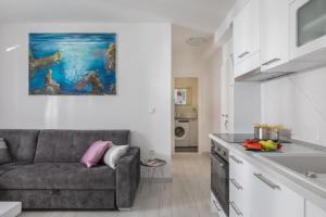 Kuchyňa alebo kuchynka v ubytovaní Hortenzija Apartments