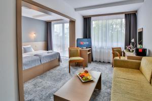 Posteľ alebo postele v izbe v ubytovaní LH Parkhotel Hluboka Nad Vltavou Congress & Wellness