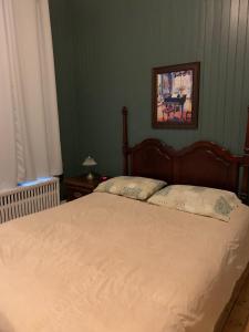 Voodi või voodid majutusasutuse Gîte Le Roupillon en Beauce toas