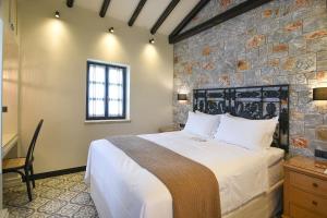 Posteľ alebo postele v izbe v ubytovaní Polismata - Private Residences