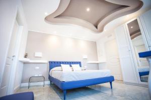 Postel nebo postele na pokoji v ubytování Cavalieri D'Oro Luxury House