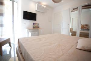 Postel nebo postele na pokoji v ubytování Cavalieri D'Oro Luxury House
