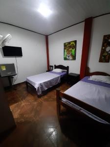 Hostal Selvatrip客房内的一张或多张床位