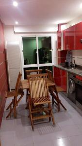 Kuchyň nebo kuchyňský kout v ubytování Cala Iris Appartement de vacances