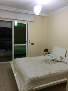 Postel nebo postele na pokoji v ubytování Cala Iris Appartement de vacances