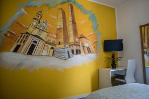 Telewizja i/lub zestaw kina domowego w obiekcie FLY HOUSE BOLOGNA...un appartamento al volo