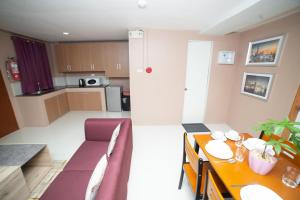 Kuchyň nebo kuchyňský kout v ubytování JSB Suites + 19 fotografií