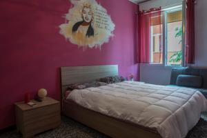 Posteľ alebo postele v izbe v ubytovaní FLY HOUSE BOLOGNA...un appartamento al volo