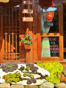Φωτογραφία από το άλμπουμ του Juxian Boutique Homestay σε Λιγιάνγκ