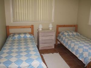 Ein Bett oder Betten in einem Zimmer der Unterkunft Slipways 4 of 1 Wharf Street Laurieton NSW 2443