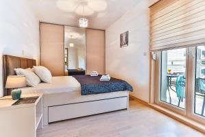 Кровать или кровати в номере Luxury Fontana Apartments