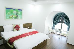 Voodi või voodid majutusasutuse Ocean Hotel toas