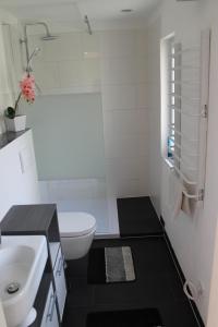 Koupelna v ubytování Ferienwohnung in Bodden & Ostsee nähe