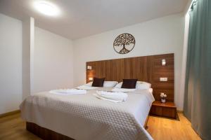 Postel nebo postele na pokoji v ubytování WX Hotel