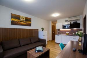 Kuchyň nebo kuchyňský kout v ubytování WX Hotel