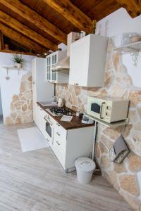 Kuchyň nebo kuchyňský kout v ubytování Apartman Rebecca