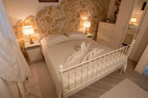 Postel nebo postele na pokoji v ubytování Apartman Rebecca