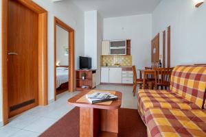 TV a/nebo společenská místnost v ubytování Hotel Posejdon