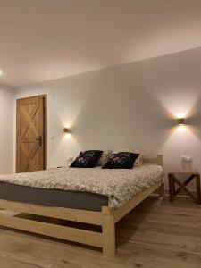 Voodi või voodid majutusasutuse Istebna Pełna Chata II toas