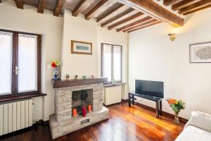 TV a/nebo společenská místnost v ubytování Parma Oltretorrente Cozy Minihouse