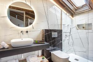 Ett badrum på IALNA Boutique Hotel