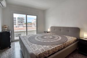 Posteľ alebo postele v izbe v ubytovaní Albatros Apartament per 5 persones en ple centre amb gran terrassa i aparcament a 5 minuts de la Platja Gran