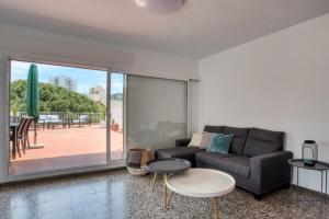 Posedenie v ubytovaní Albatros Apartament per 5 persones en ple centre amb gran terrassa i aparcament a 5 minuts de la Platja Gran