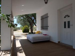 A bed or beds in a room at Casa de Pascual