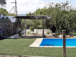 Basen w obiekcie Vivienda Rural Maestro Herrador lub w pobliżu