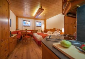 TV a/nebo společenská místnost v ubytování Arlsuites