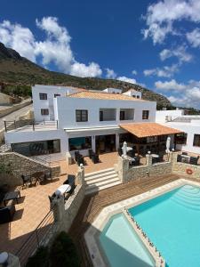 A view of the pool at Amazones Village Suites or nearby