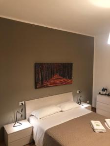 Postel nebo postele na pokoji v ubytování Guest House Brianza Room