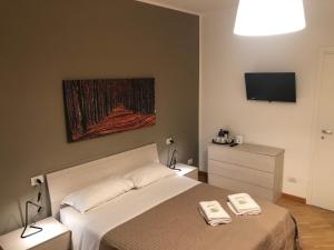 Postel nebo postele na pokoji v ubytování Guest House Brianza Room