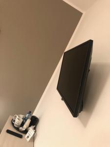 TV a/nebo společenská místnost v ubytování Guest House Brianza Room