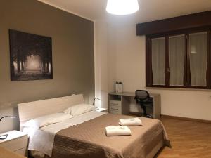 Postel nebo postele na pokoji v ubytování Guest House Brianza Room