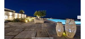 Bazén v ubytovaní Harma Villas alebo v jeho blízkosti