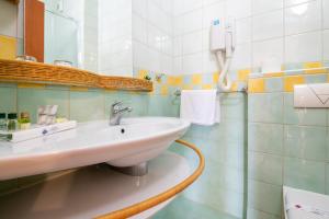 Koupelna v ubytování Hotel Posejdon + 34 fotografií