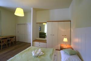 Ένα ή περισσότερα κρεβάτια σε δωμάτιο στο Resort Líšenský Dvůr