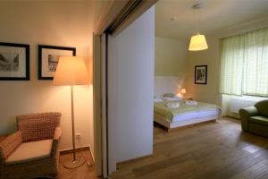Ένα ή περισσότερα κρεβάτια σε δωμάτιο στο Resort Líšenský Dvůr