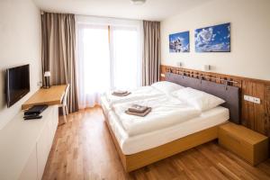Ένα ή περισσότερα κρεβάτια σε δωμάτιο στο Resort Líšenský Dvůr