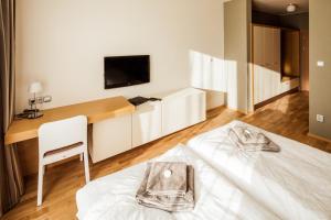 Ένα ή περισσότερα κρεβάτια σε δωμάτιο στο Resort Líšenský Dvůr