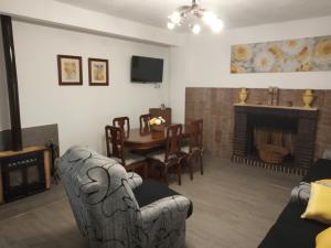 A television and/or entertainment centre at Casa de Pascual
