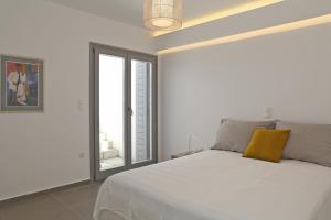 Posteľ alebo postele v izbe v ubytovaní Harma Villas