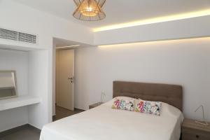 Posteľ alebo postele v izbe v ubytovaní Harma Villas
